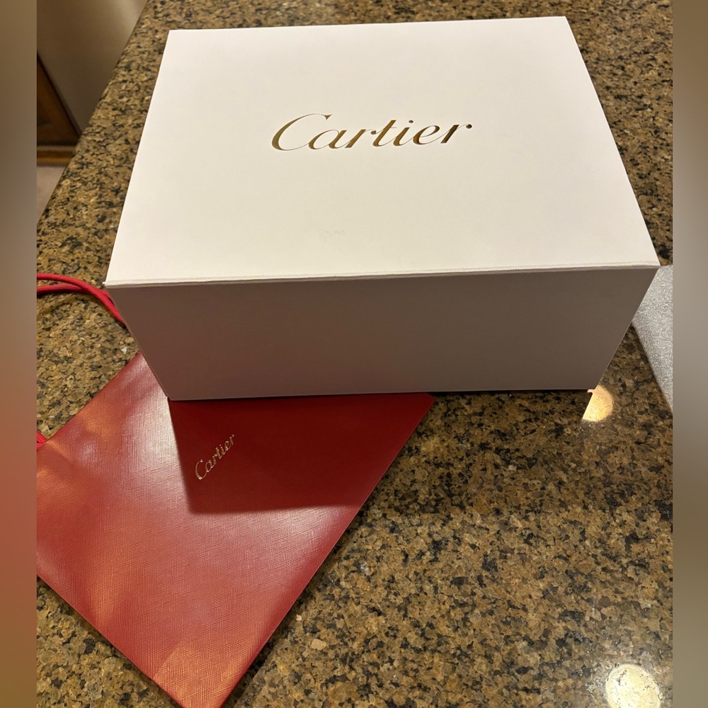 Cartier gift box and iconic red gift bag